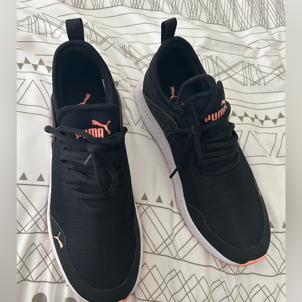 Black and pink Puma size 8